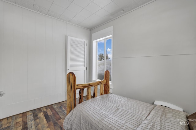 bedroom featuring wood-type flooring