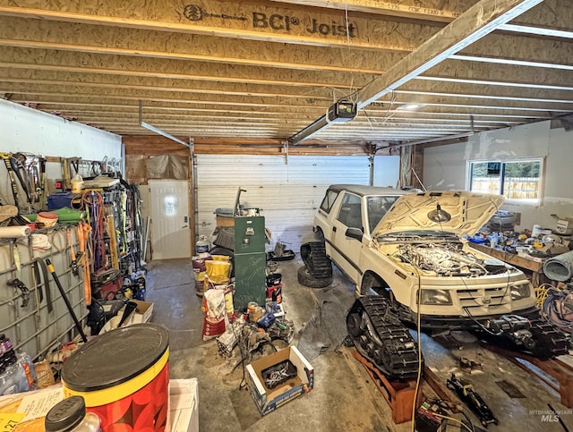 garage featuring a garage door opener