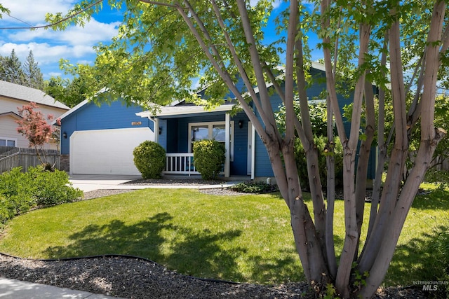 11031 W Red Maple Dr, Boise, ID 83709 - view of front of property with concrete driveway, an attached garage, and covered porch