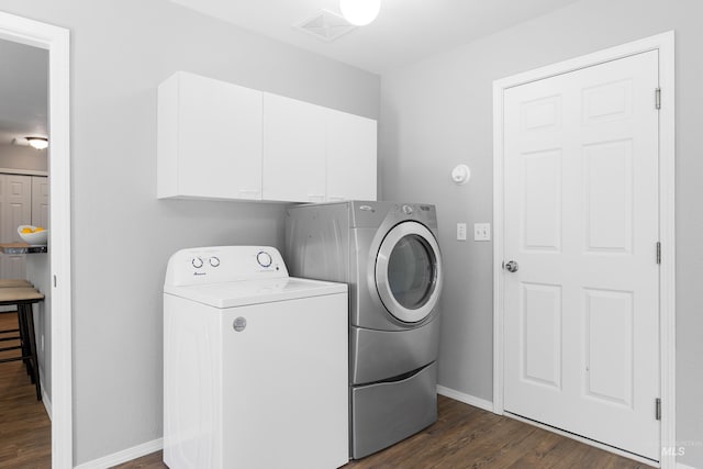 11031 W Red Maple Dr, Boise, ID 83709 - laundry area with cabinet space, independent washer and dryer, and dark wood-type flooring