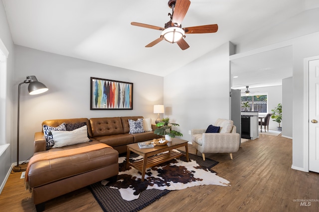 11031 W Red Maple Dr, Boise, ID 83709 - living area featuring ceiling fan, lofted ceiling, and wood finished floors