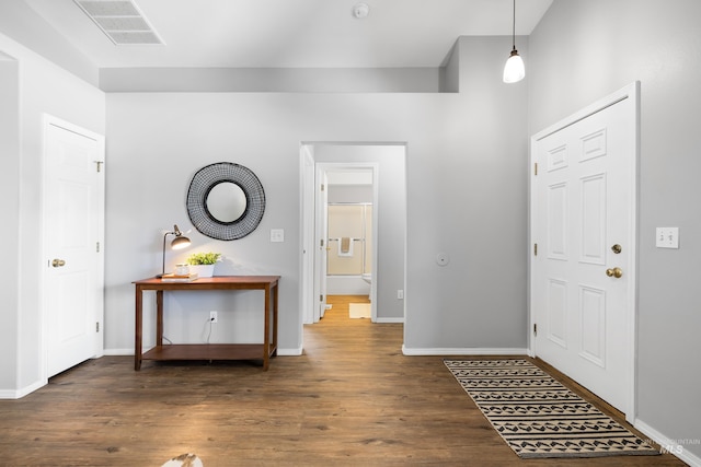 11031 W Red Maple Dr, Boise, ID 83709 - foyer with wood finished floors and baseboards