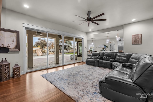 3136 S Bear Claw Way, Meridian, ID 83642 - living room with a ceiling fan, wood finished floors, and recessed lighting