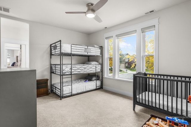 3136 S Bear Claw Way, Meridian, ID 83642 - carpeted bedroom with a ceiling fan and baseboards
