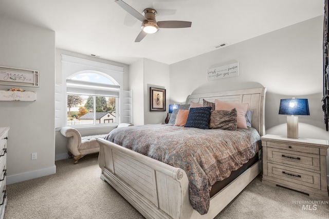 3136 S Bear Claw Way, Meridian, ID 83642 - bedroom with light carpet, baseboards, and a ceiling fan