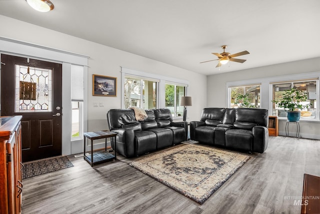 3136 S Bear Claw Way, Meridian, ID 83642 - living area featuring wood finished floors and a ceiling fan