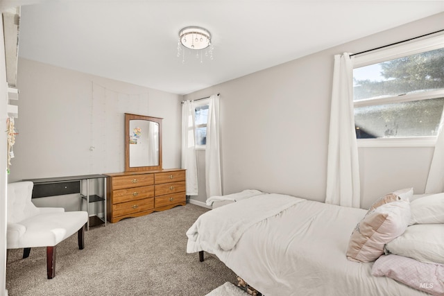 bedroom with light colored carpet