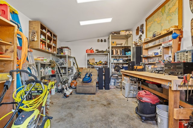 interior space with concrete flooring and a workshop area