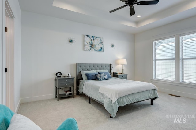 3661 S Corabell Way, Meridian, ID 83642 - bedroom featuring a raised ceiling, baseboards, light carpet, ceiling fan, and recessed lighting