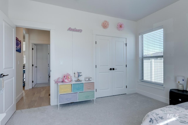 3661 S Corabell Way, Meridian, ID 83642 - carpeted bedroom featuring multiple windows, baseboards, and a closet