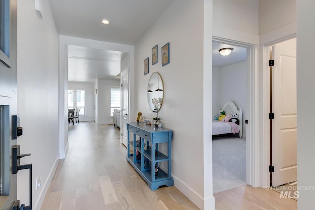 3661 S Corabell Way, Meridian, ID 83642 - hall with light wood-type flooring, baseboards, and recessed lighting