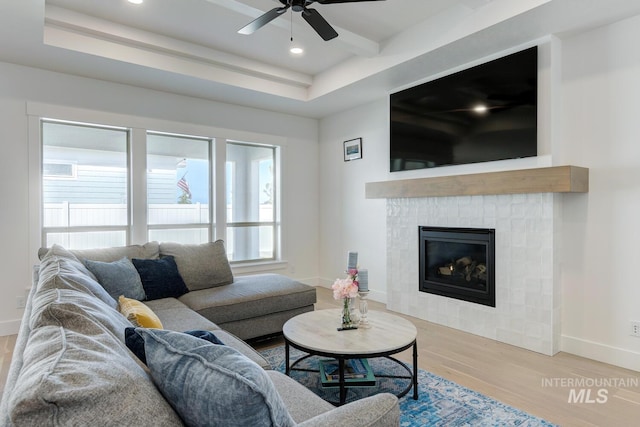 3661 S Corabell Way, Meridian, ID 83642 - living area featuring wood finished floors, ceiling fan, a tile fireplace, baseboards, and recessed lighting