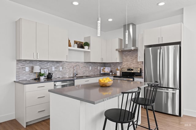 509 E Violets Cove Ln, Garden City, ID 83714 - kitchen featuring wall chimney exhaust hood, open shelves, dark countertops, a sink, and stainless steel appliances