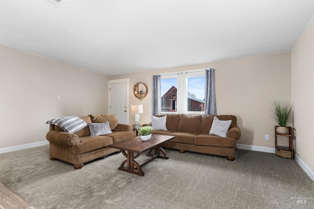 carpeted living room with baseboards