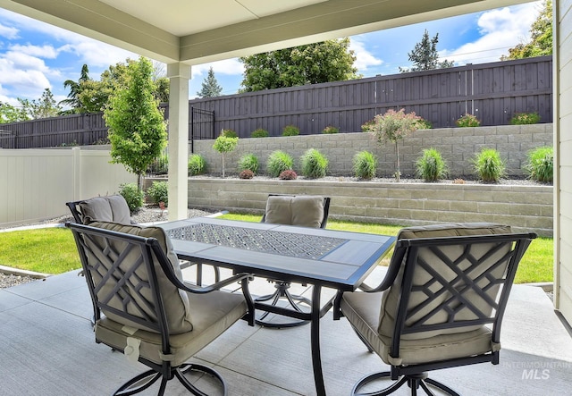 2499 E Berghan Ln, Meridian, ID 83642 - fenced backyard featuring outdoor dining space and a patio