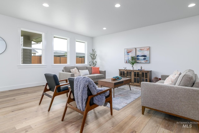 living room with light hardwood / wood-style floors