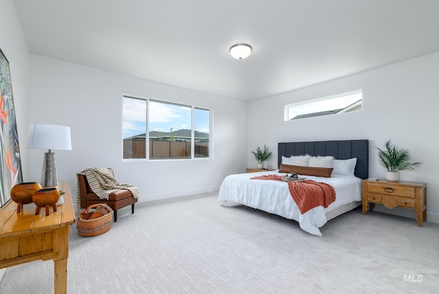 bedroom featuring carpet