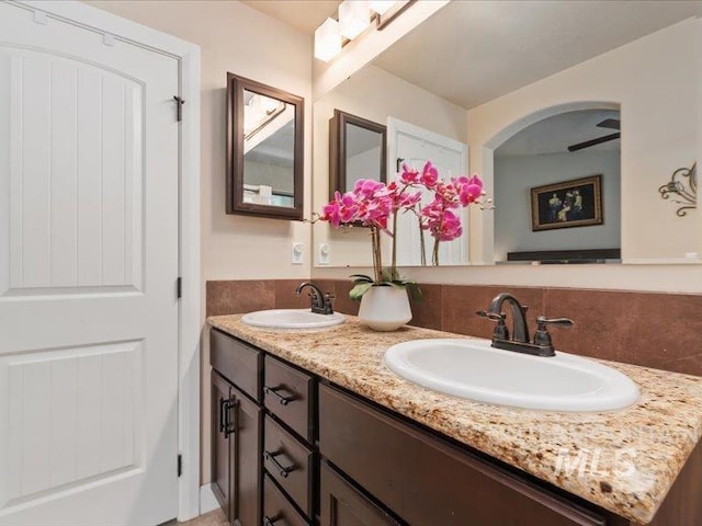 5747 W Rotherham Dr, Eagle, ID 83616 - bathroom with double vanity and backsplash