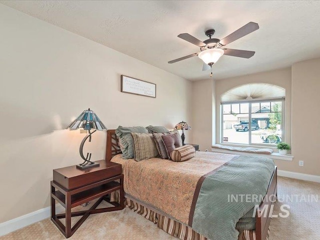 5747 W Rotherham Dr, Eagle, ID 83616 - bedroom with light carpet and a ceiling fan