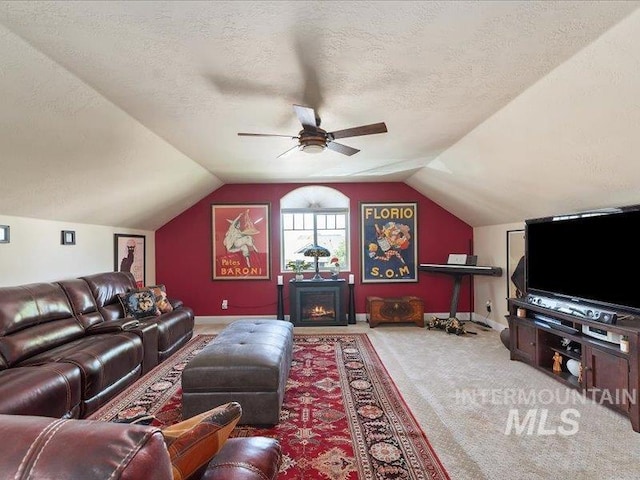 5747 W Rotherham Dr, Eagle, ID 83616 - living area with carpet, ceiling fan, a textured ceiling, and lofted ceiling