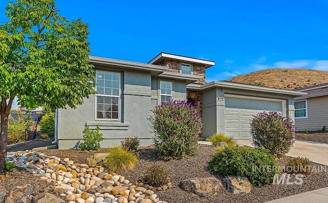 view of front of property featuring a garage