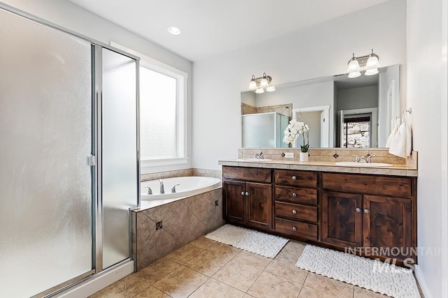 bathroom with vanity, separate shower and tub, and tile patterned flooring