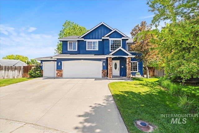 1209 W Hawk Ct, Nampa, ID 83651 - craftsman inspired home featuring concrete driveway, board and batten siding, an attached garage, and stone siding