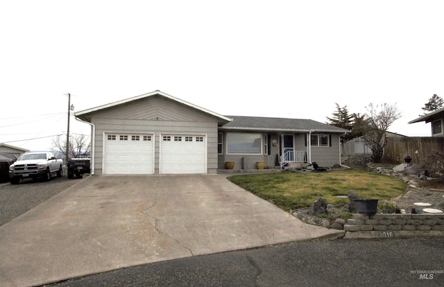 single story home featuring driveway, a front lawn, an attached garage, and fence