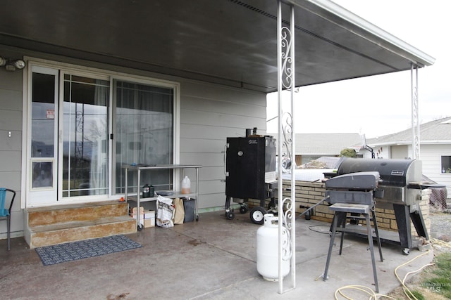 view of patio with a grill