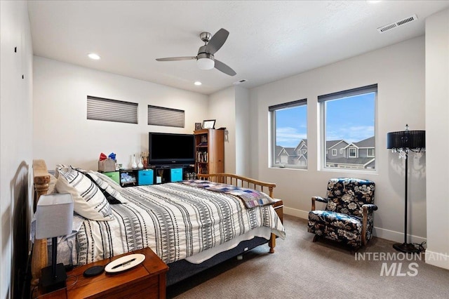 carpeted bedroom with ceiling fan