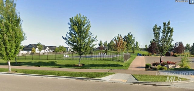 surrounding community with a lawn