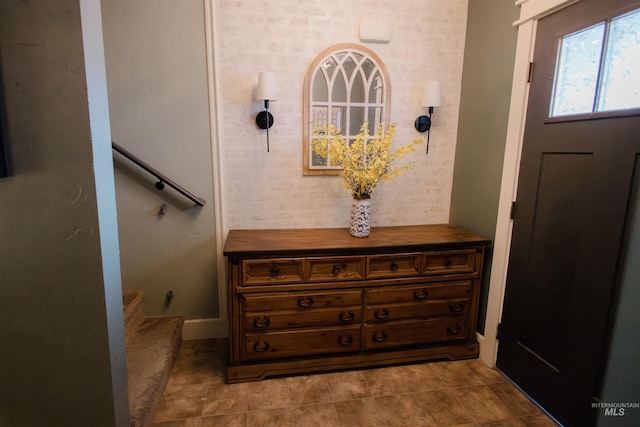 foyer entrance featuring stairway