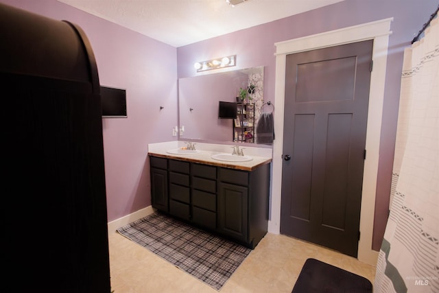 bathroom with double vanity