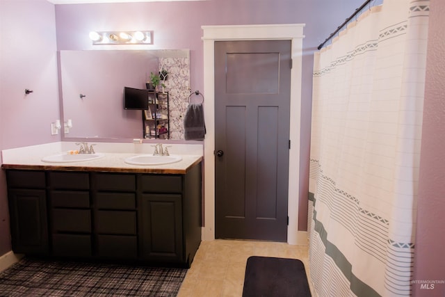 full bathroom with double vanity and tile patterned floors