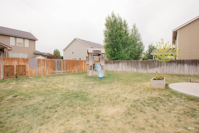 view of yard with a playground