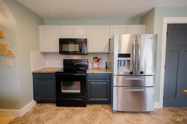 kitchen featuring black appliances, white cabinetry, light countertops, and baseboards