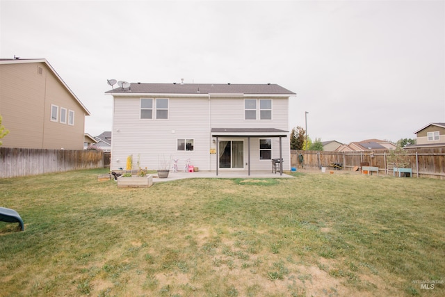 rear view of house featuring a patio area