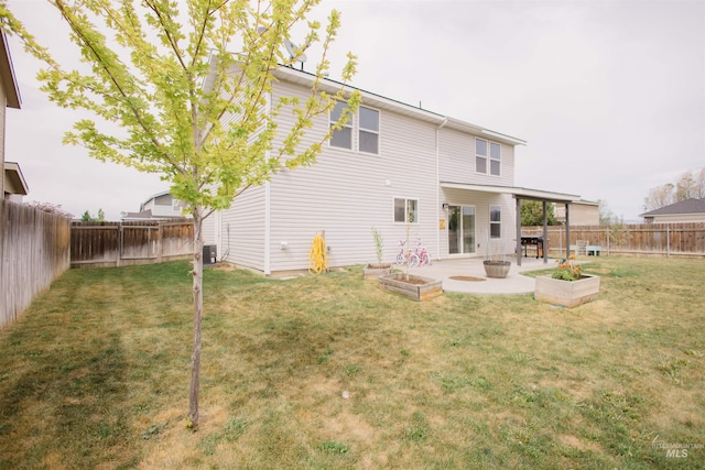 rear view of house featuring a patio area and central air condition unit