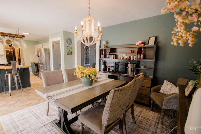 dining room featuring a chandelier