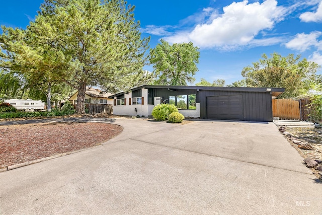 ranch-style home with a garage