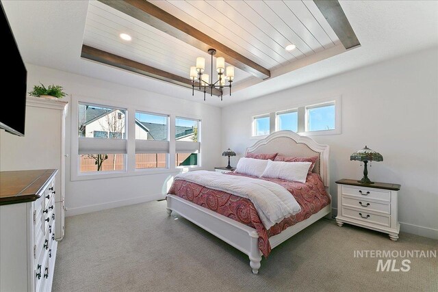 bedroom with light carpet, beam ceiling, baseboards, and a notable chandelier