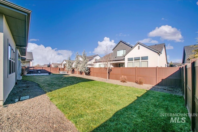 view of yard featuring a fenced backyard