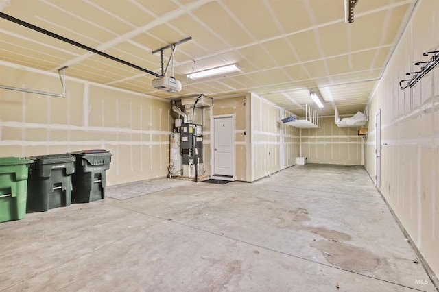 garage with a garage door opener and water heater