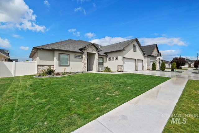 view of front facade featuring a front lawn and a garage