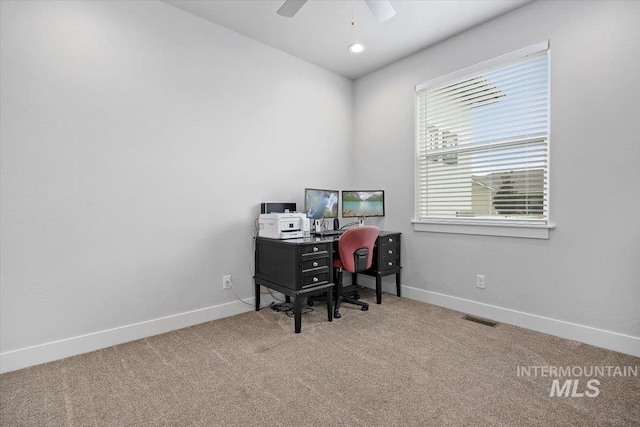 office area featuring carpet and ceiling fan