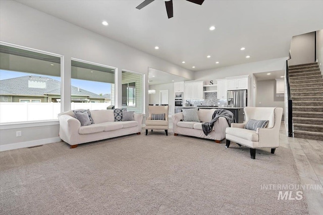 living room with ceiling fan