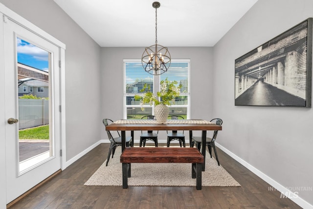 12041 W Ardyce, Boise, ID 83713 - dining room with a chandelier, baseboards, and wood finished floors