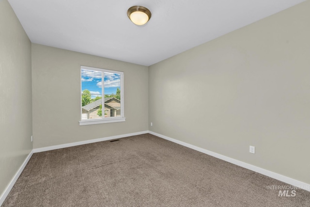 12041 W Ardyce, Boise, ID 83713 - spare room featuring carpet and baseboards