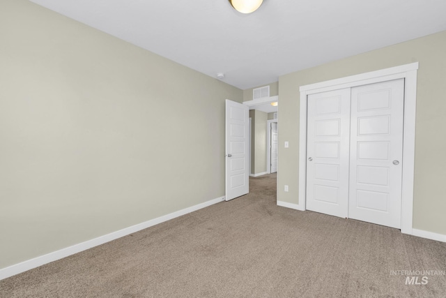 12041 W Ardyce, Boise, ID 83713 - unfurnished bedroom with carpet, baseboards, and a closet