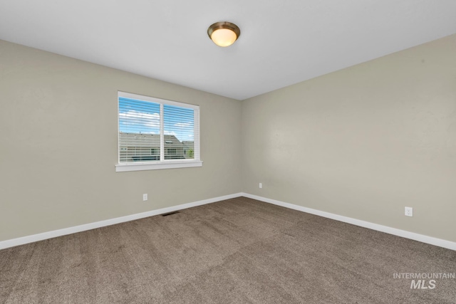 12041 W Ardyce, Boise, ID 83713 - empty room featuring baseboards and carpet flooring